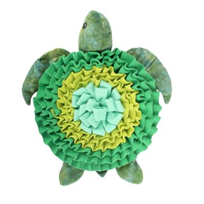 snusemåtte i grønne og gule farve formet som en skildpadde