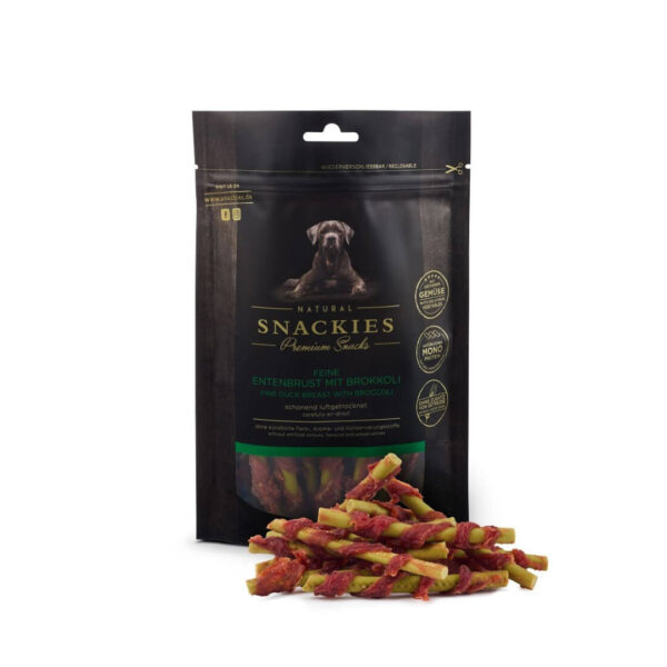 Snackies Andebryst med Broccoli 170g i en sort pose med grøn skrift og en hund afbilledet på forsiden